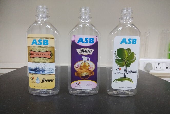 Liquor bottles with label molded by ASB-12M v2